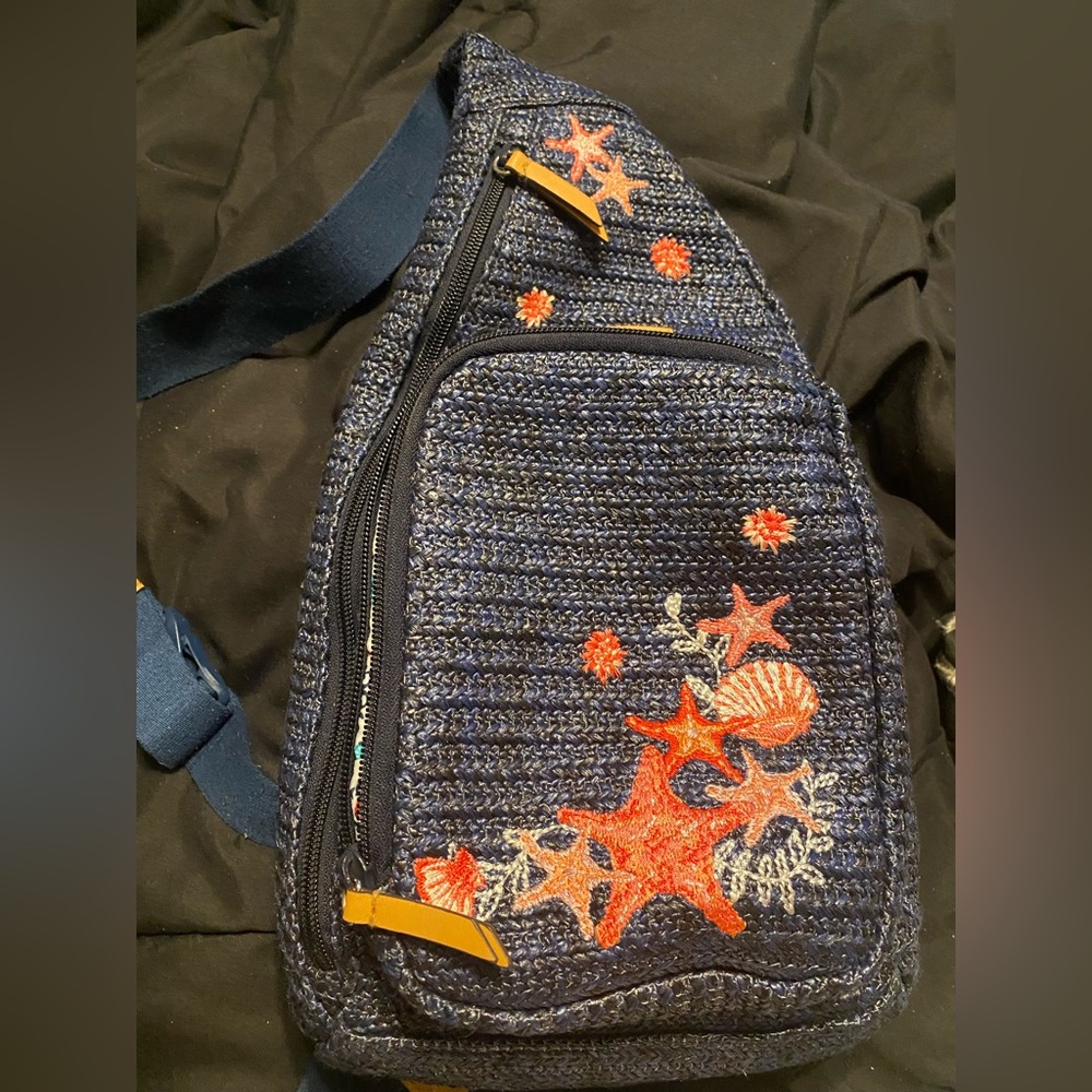 Vera Bradley medium backpack purse.  Straw material. Blue, gently used.